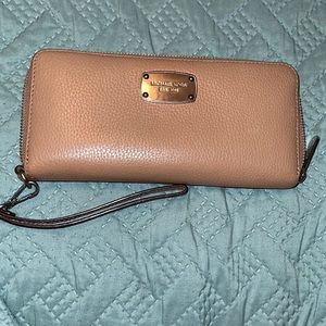 Tan MK wallet! Good condition.